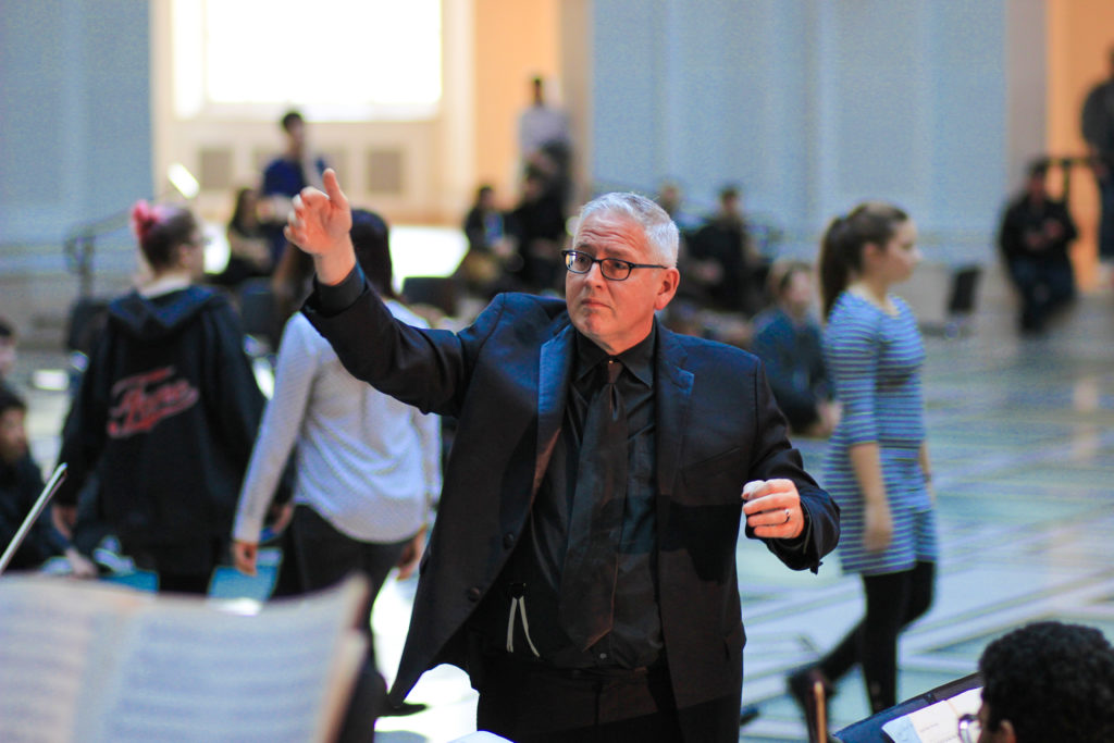 David Hayes leads the Mannes Orchestra in selections from the Philip Glass opera, Akhnaten, at the Brooklyn Museum